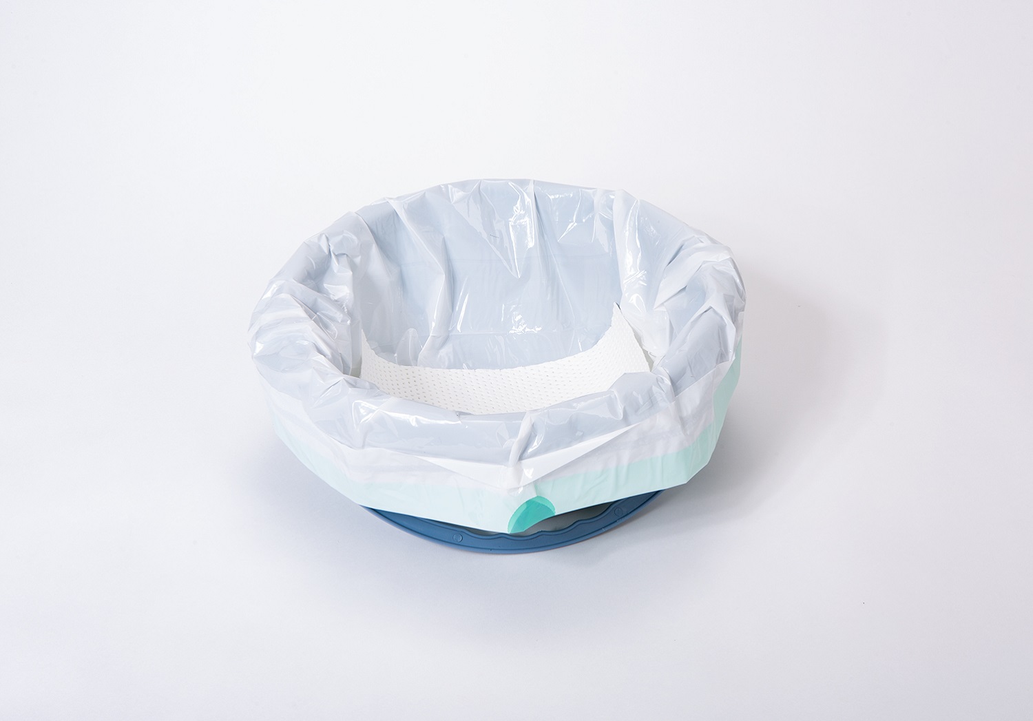 Absorbent commode liners